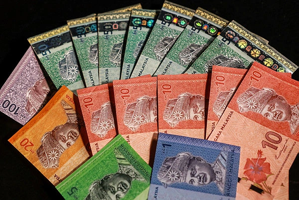 Ringgit firms against US dollar on stronger GDP growth