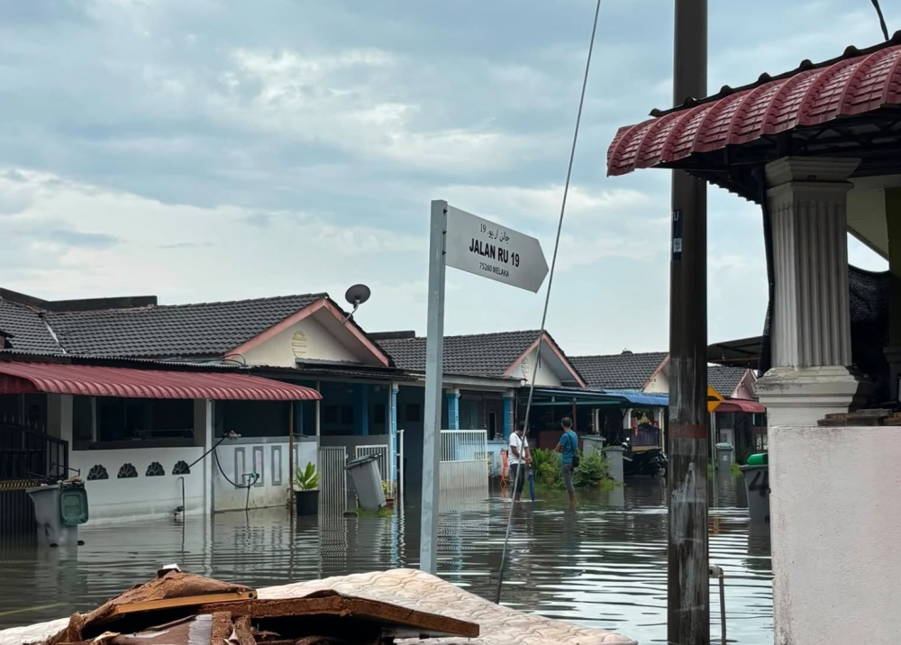 Family, including baby, rescued from Tanjung Kling flash floods