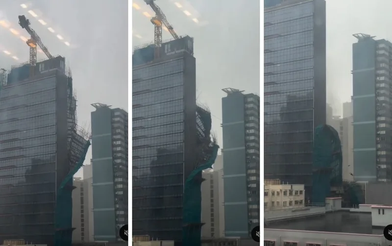 台風接近で高層ビル足場崩壊