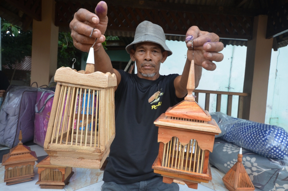 The Terengganu craftsman building custom homes for Malaysia’s singing grasshoppers