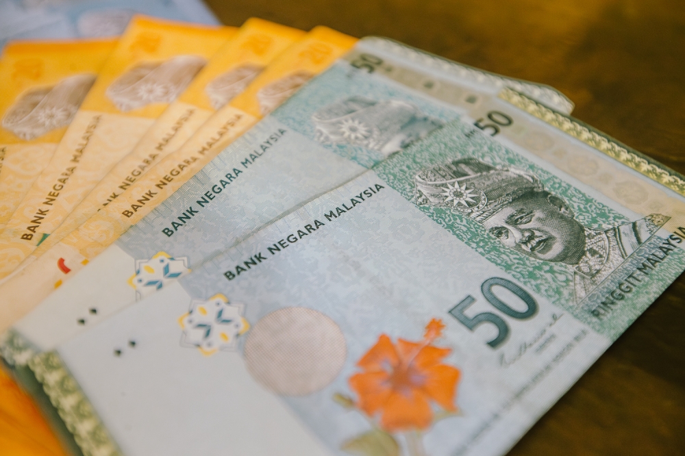 Ringgit closes higher, but gains capped ahead of US payrolls report