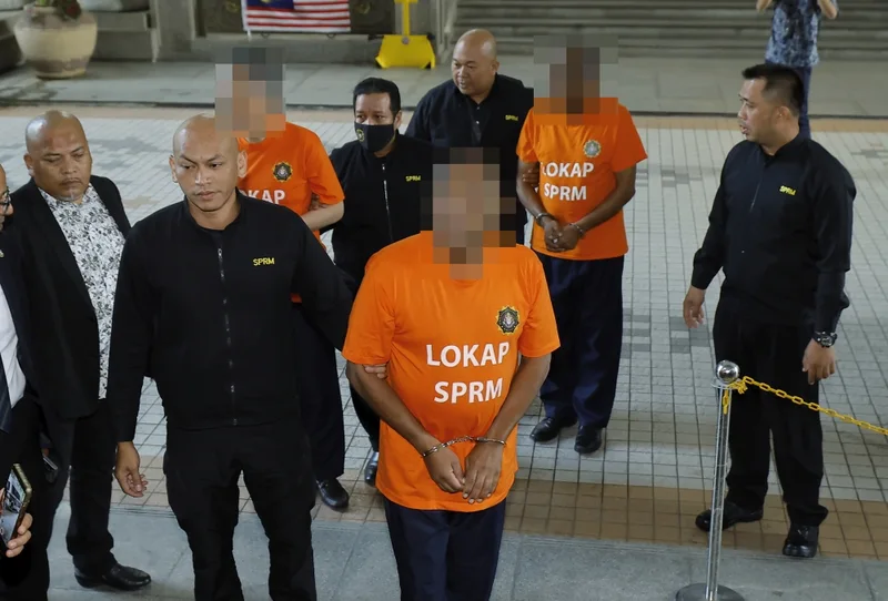 MACC、拘留容疑者へのオレンジ服着用義務を撤廃