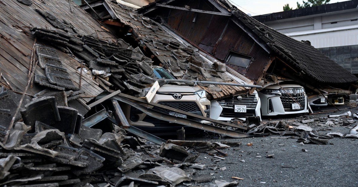 Death toll rises to 13 as rescuers search Japan quake rubble